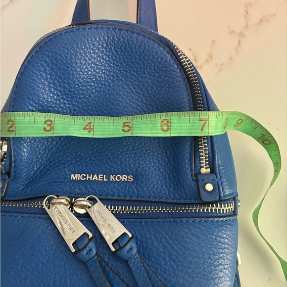 MICHAEL KORS RHEA ZIP ELECTRIC BLUE LEATHER SILVER XS X-BODY BACKPACK BAG - Picture 9 of 10
